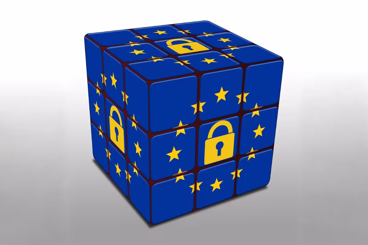 Rubic's cube with European blue and stars, and a padlock inside